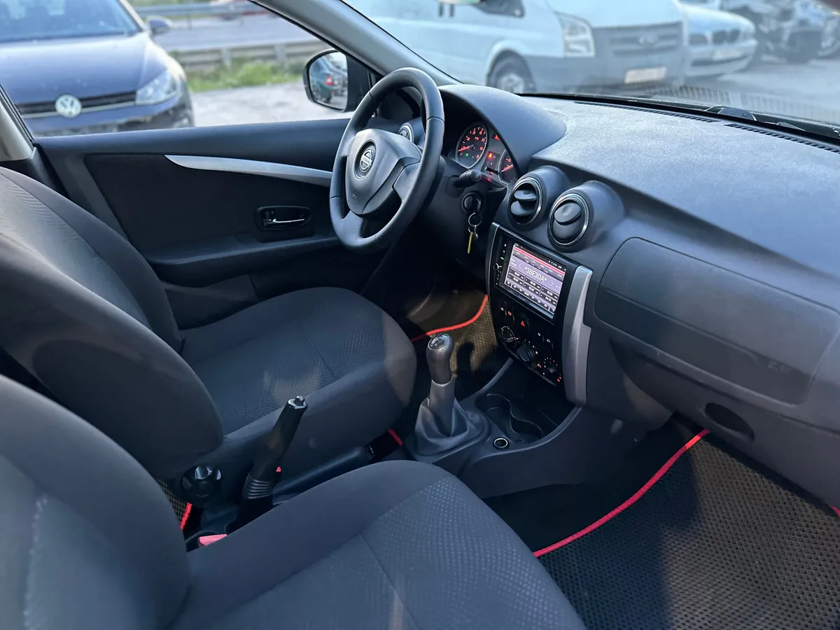 Nissan Almera 1.6 MT (102 л.с.), 2015 — фото 8
