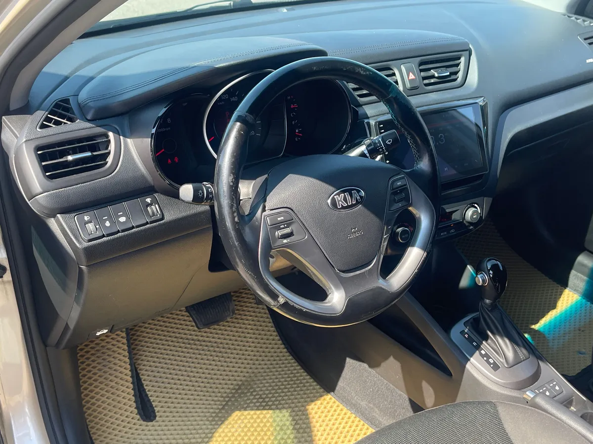 Kia Rio 1.6 AT (123 л.с.), 2015 — фото 5