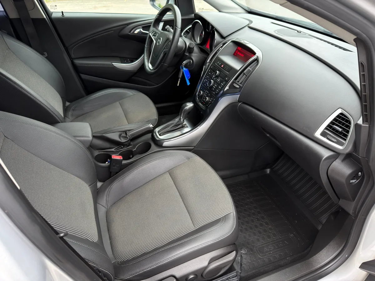 Opel Astra 1.6 AT (115 л.с.)
