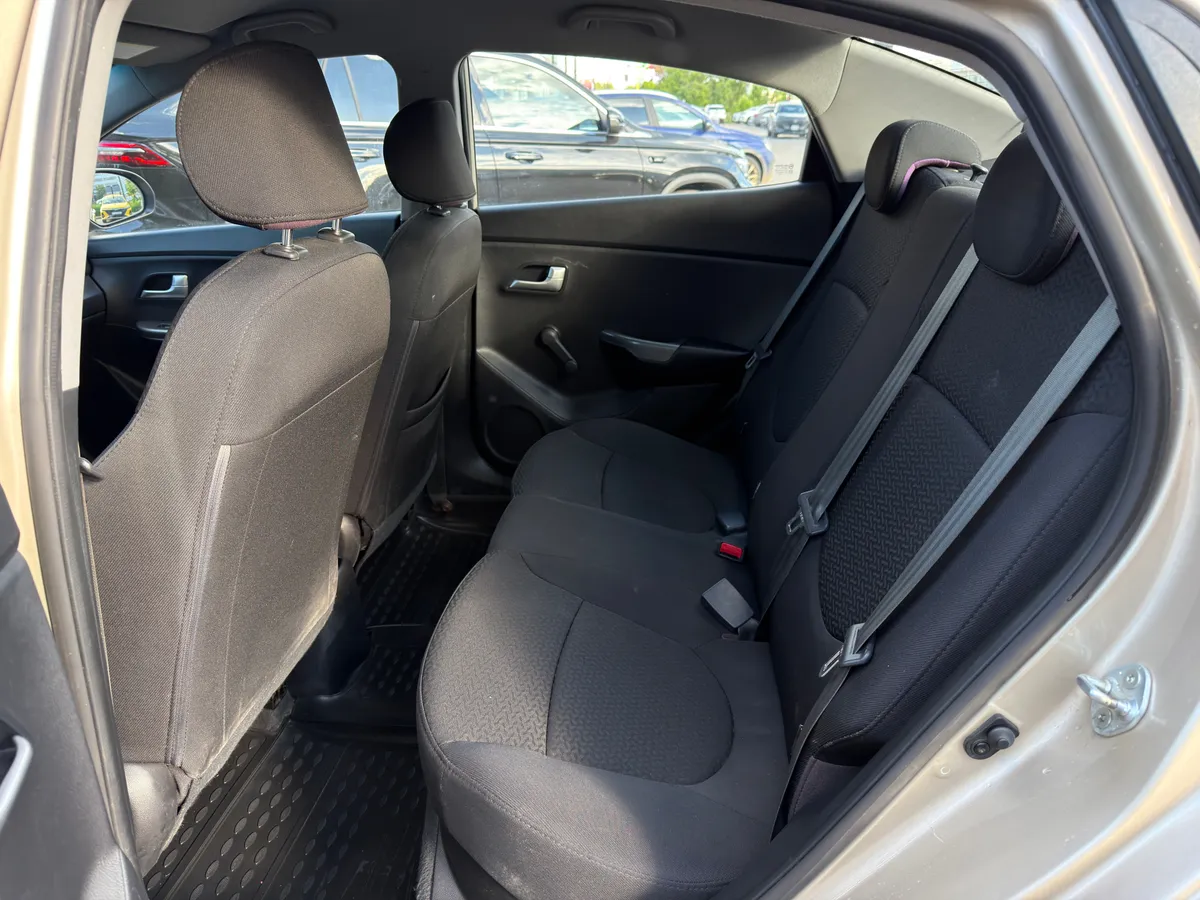 Kia Rio 1.4 AT (107 л.с.)