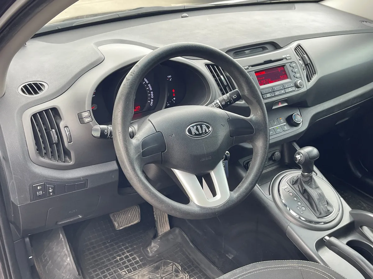 Kia Sportage 2.0 AT (150 л.с.), 2012 — фото 5