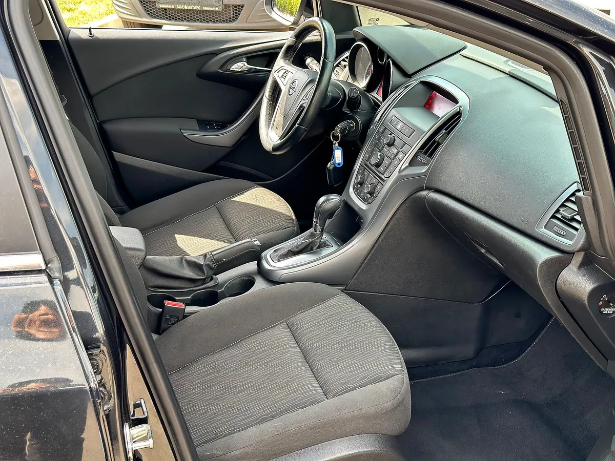 Opel Astra 1.4 Turbo AT (140 л.с.), 2014 — фото 6