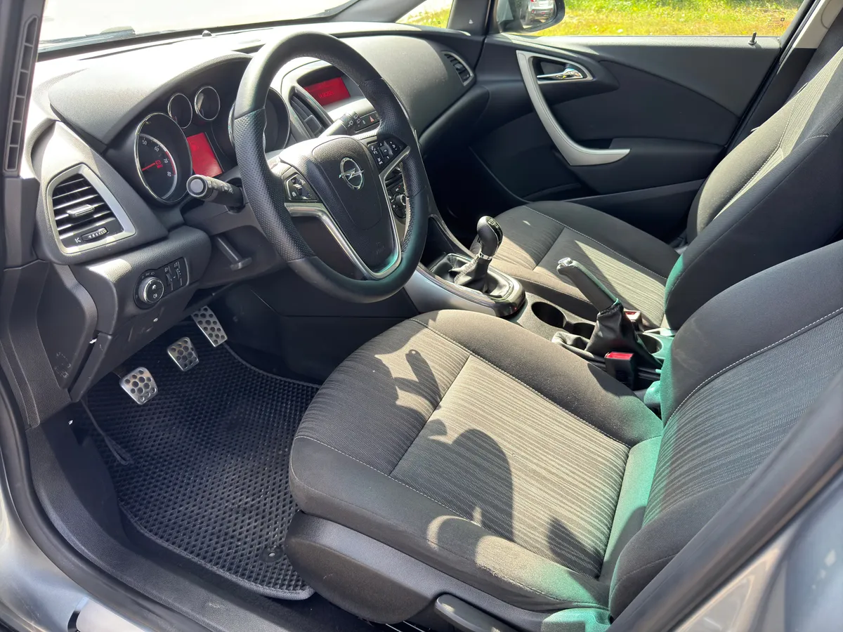 Opel Astra 1.6 MT (115 л.с.), 2010 — фото 5