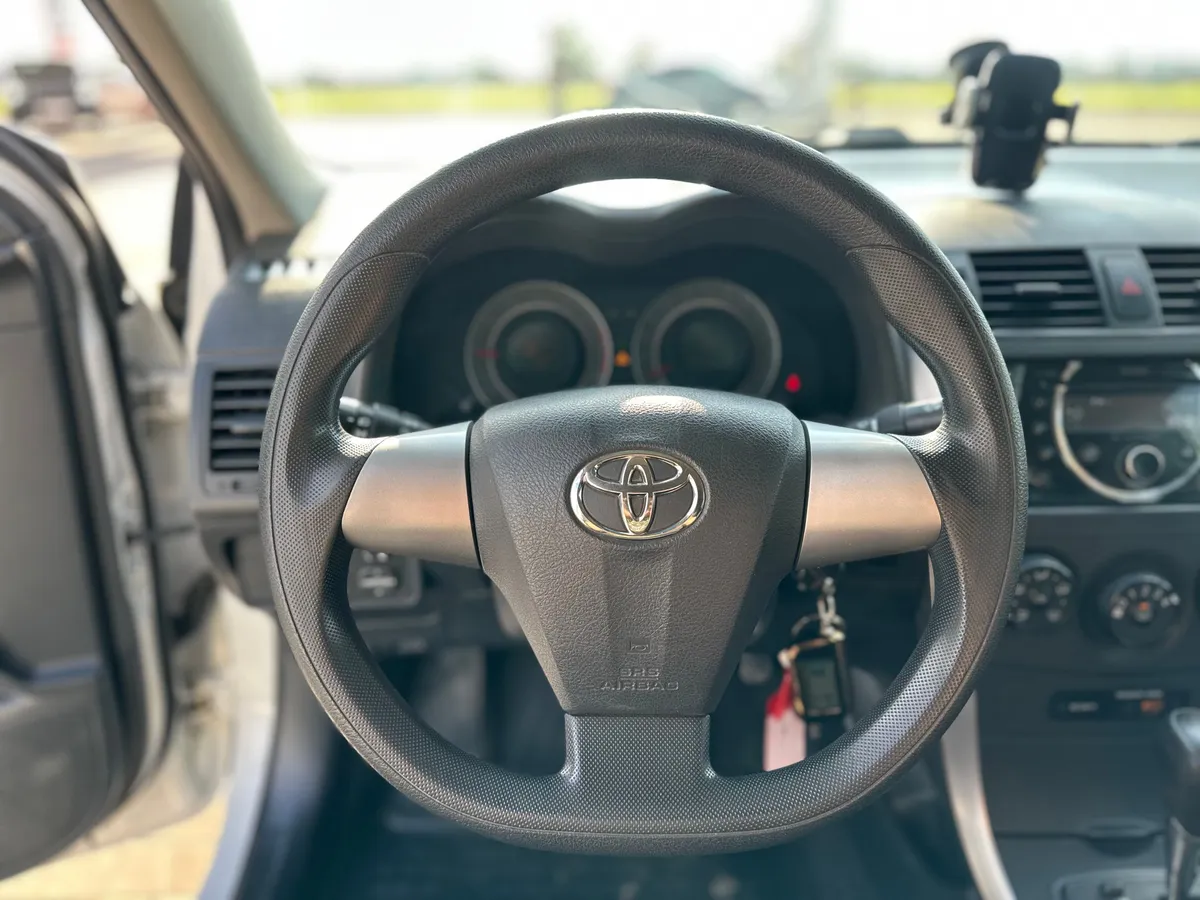 Toyota Corolla 1.6 AT (124 л.с.), 2012 — фото 7