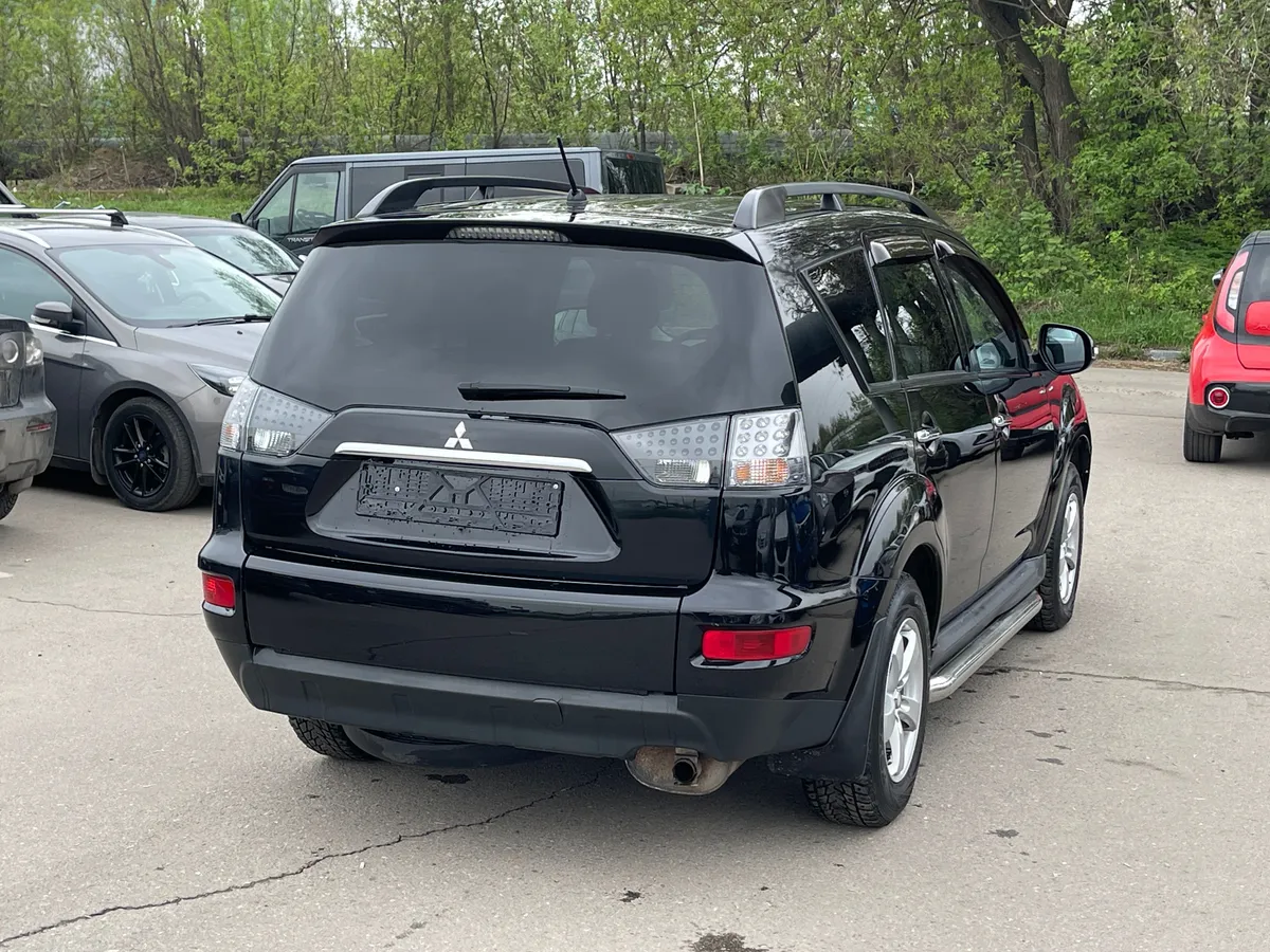 Mitsubishi Outlander 2.4 CVT (170 л.с.), 2011 — фото 4