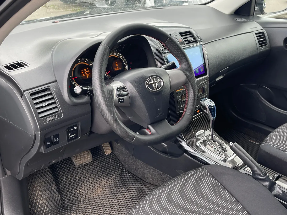 Toyota Corolla 1.6 AT (124 л.с.), 2010 — фото 5