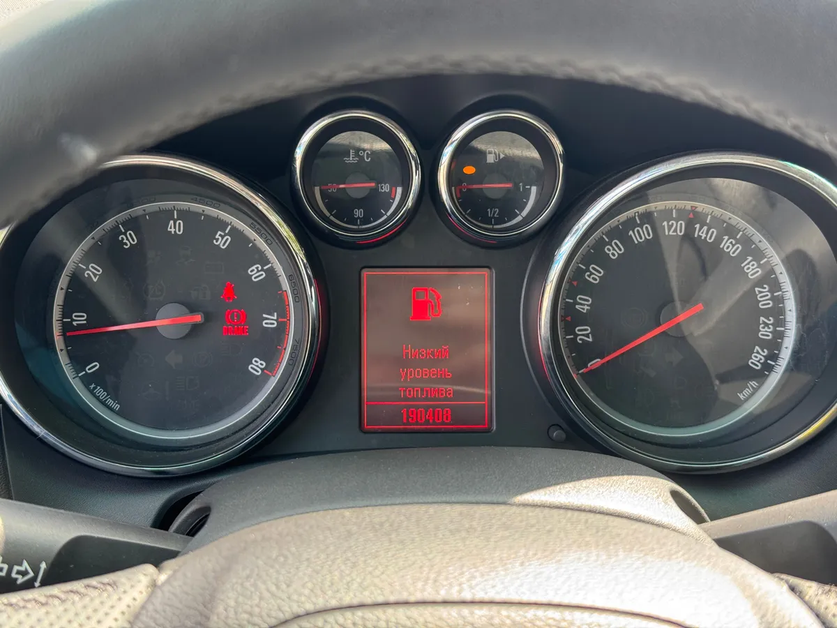 Opel Astra 1.6 MT (115 л.с.), 2010 — фото 7