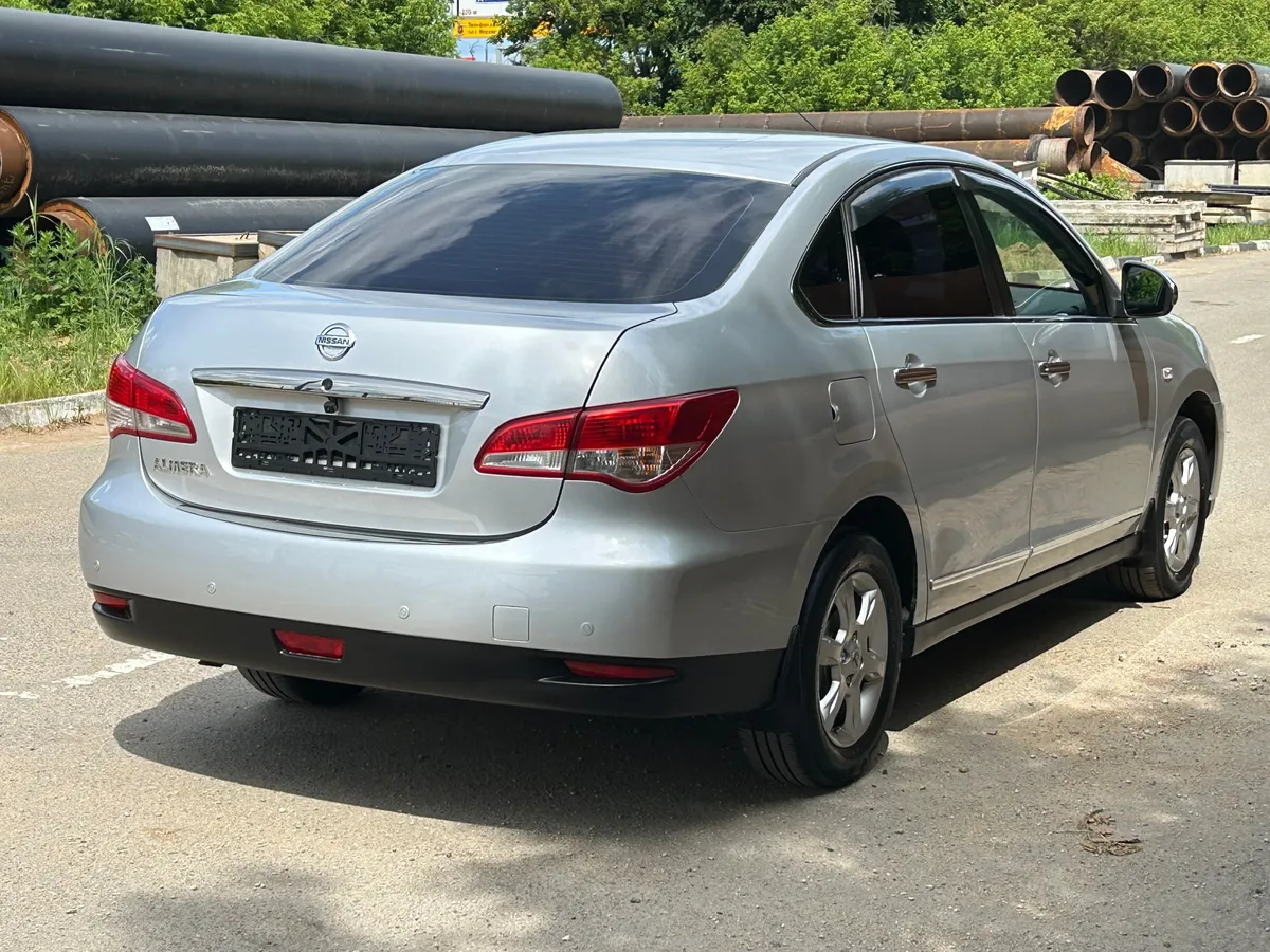 Nissan Almera 1.6 AT (102 л.с.), 2013 — фото 4