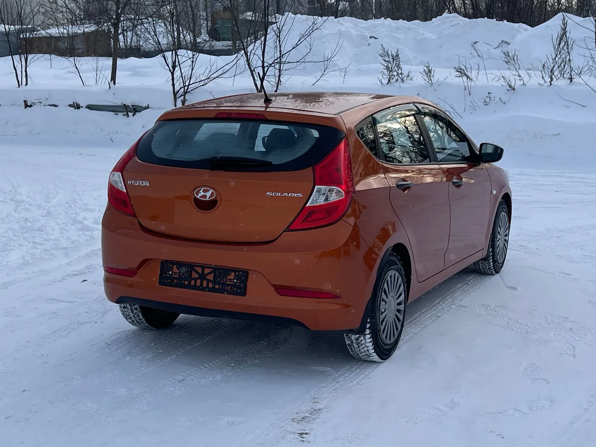 Hyundai Solaris 1.4 MT (107 л.с.), 2014 — фото 4