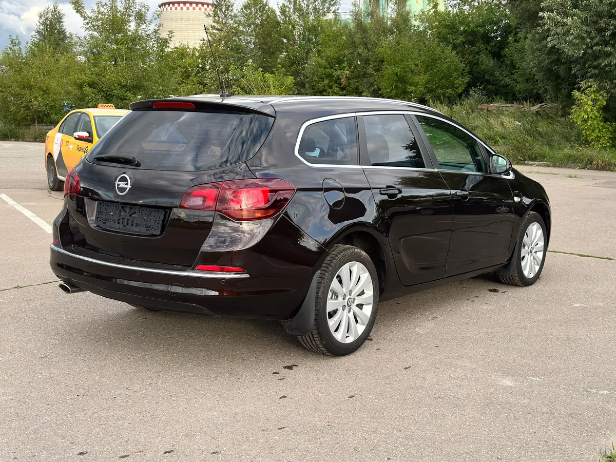 Opel Astra 1.4 Turbo AT (140 л.с.), 2014 — фото 4