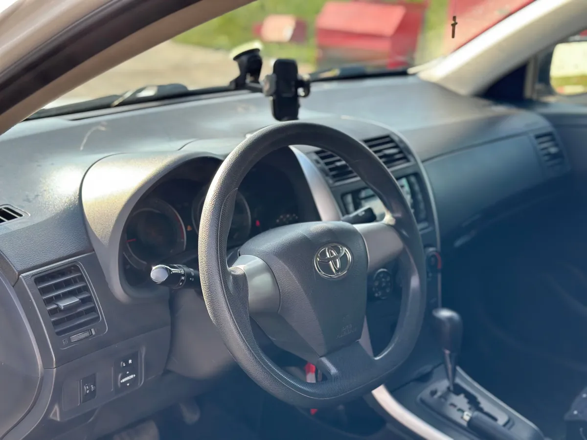 Toyota Corolla 1.6 AT (124 л.с.), 2012 — фото 8