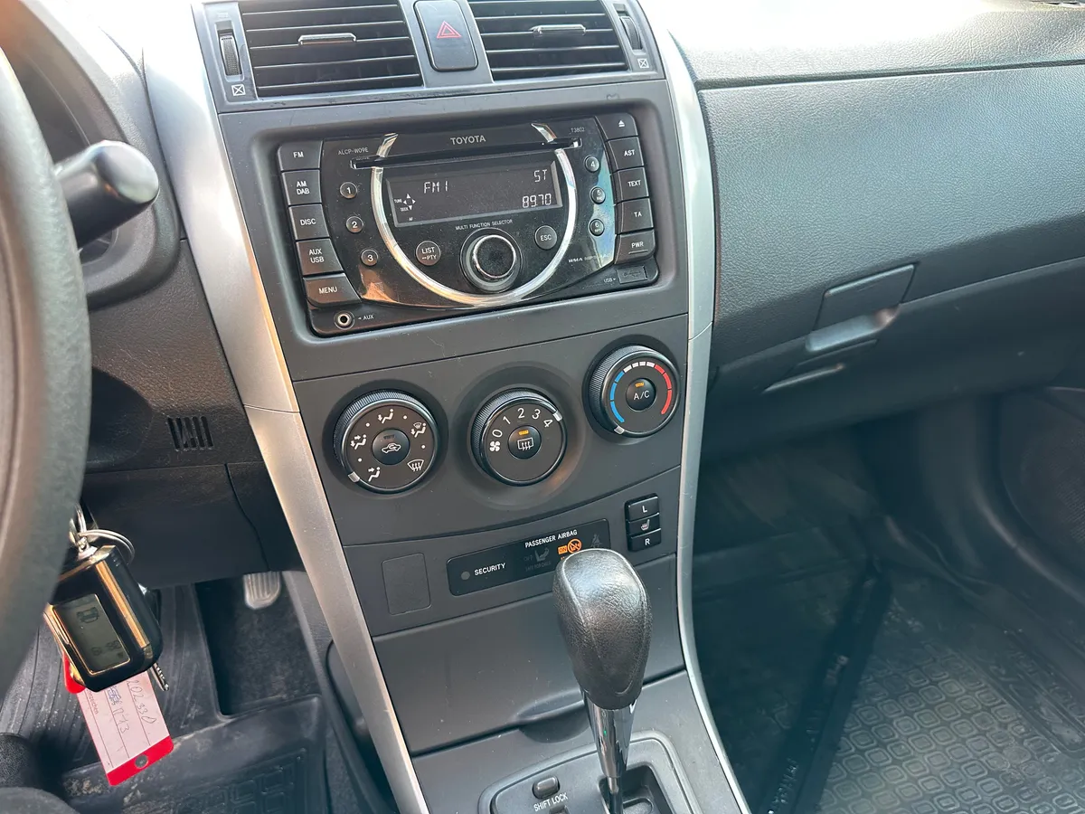 Toyota Corolla 1.6 AT (124 л.с.), 2012 — фото 12